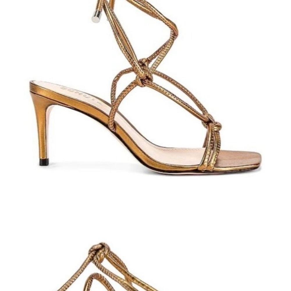 Never worn, bronze heels. 8.5